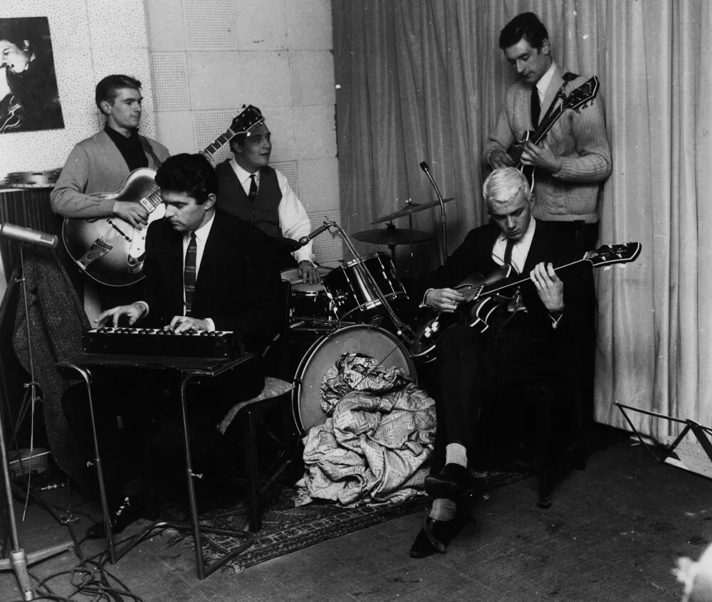 The Tornados rehearse in studio in black and white photo 