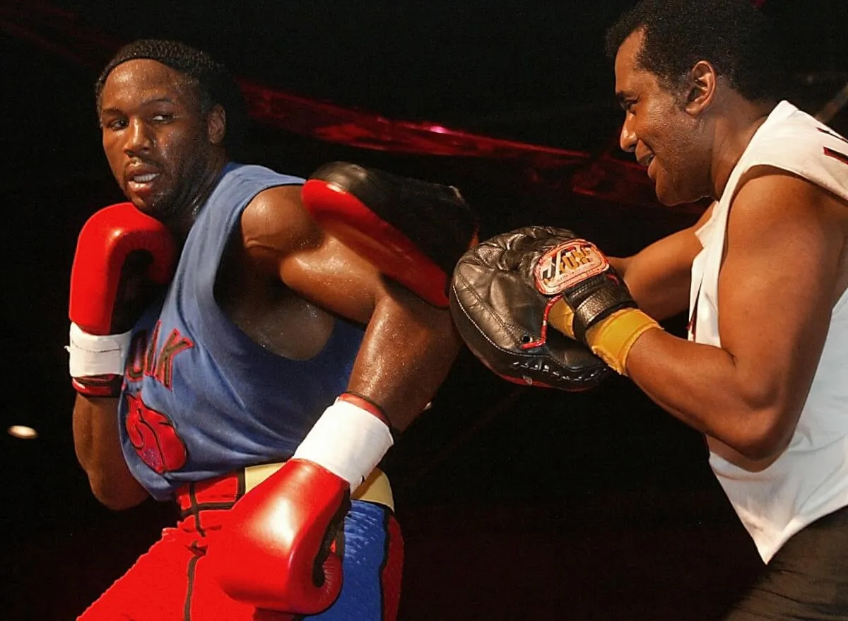 World heavyweight boxing champion Lennox Lewis (L)