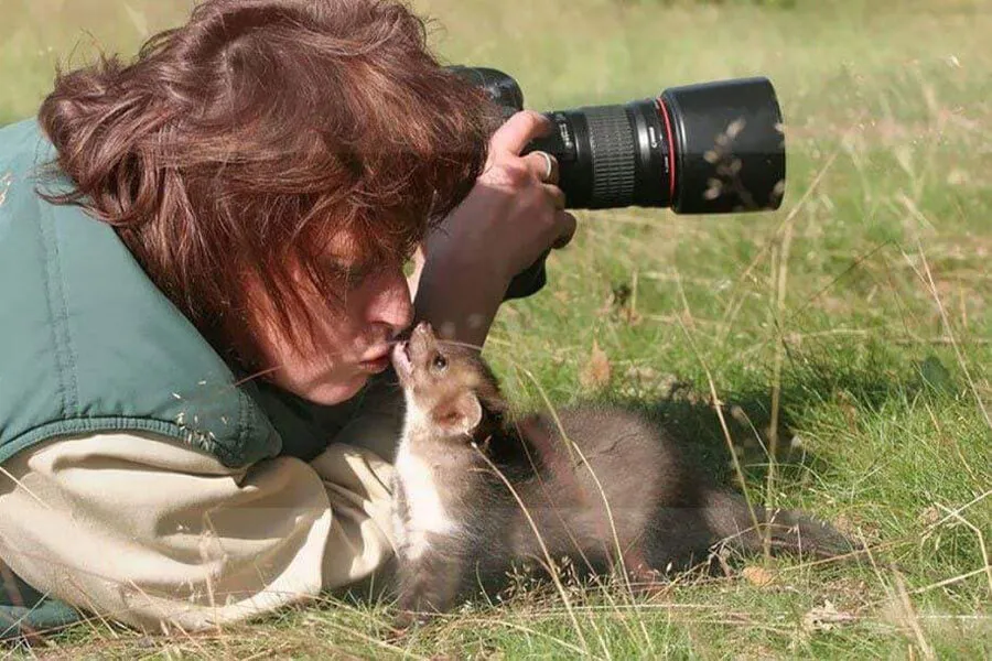animal biting photographer in nose