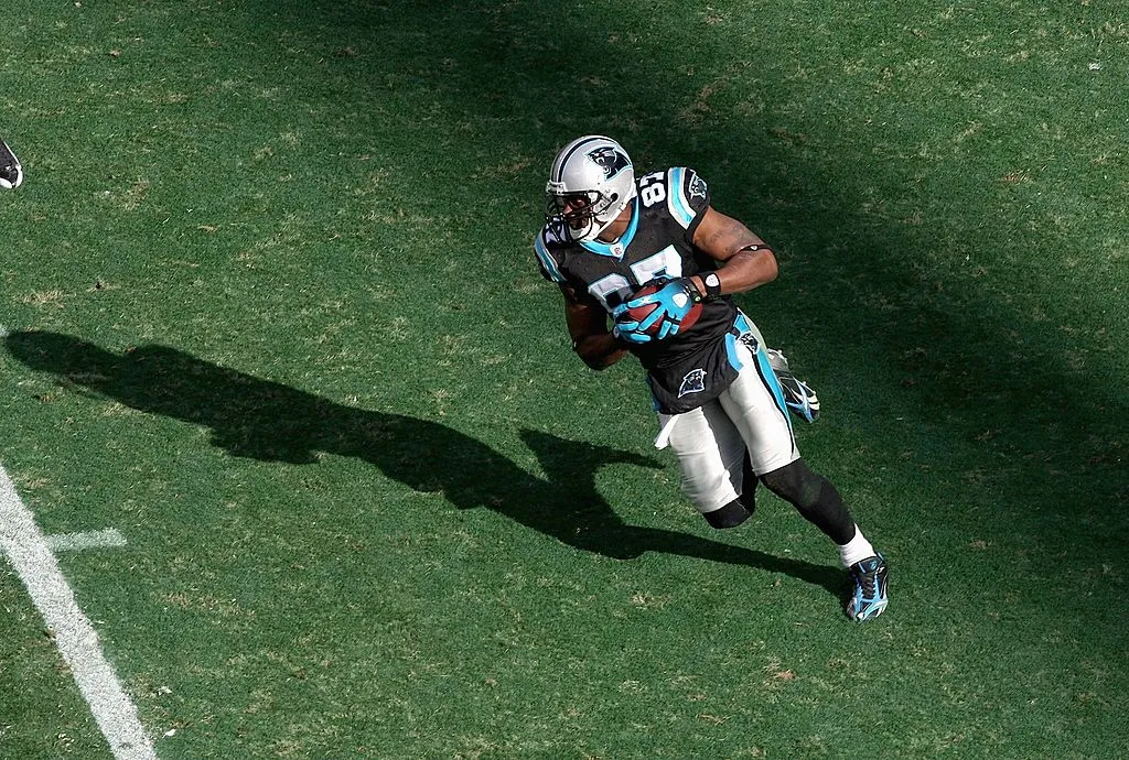Muhsin Muhammad #87 of the Carolina Panthers carries the ball during the game against the New Orleans Saints