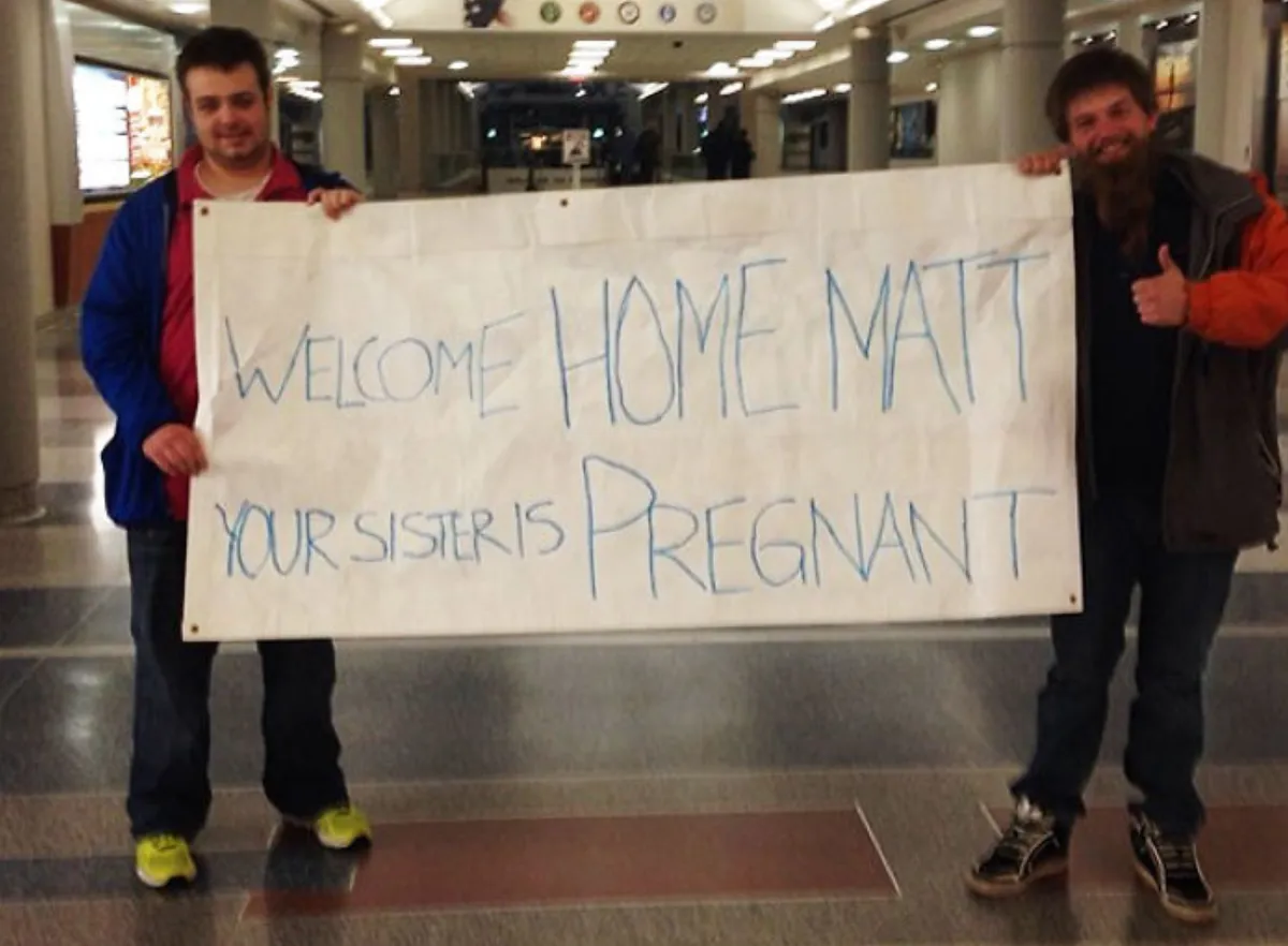Sister is pregnant airport sign
