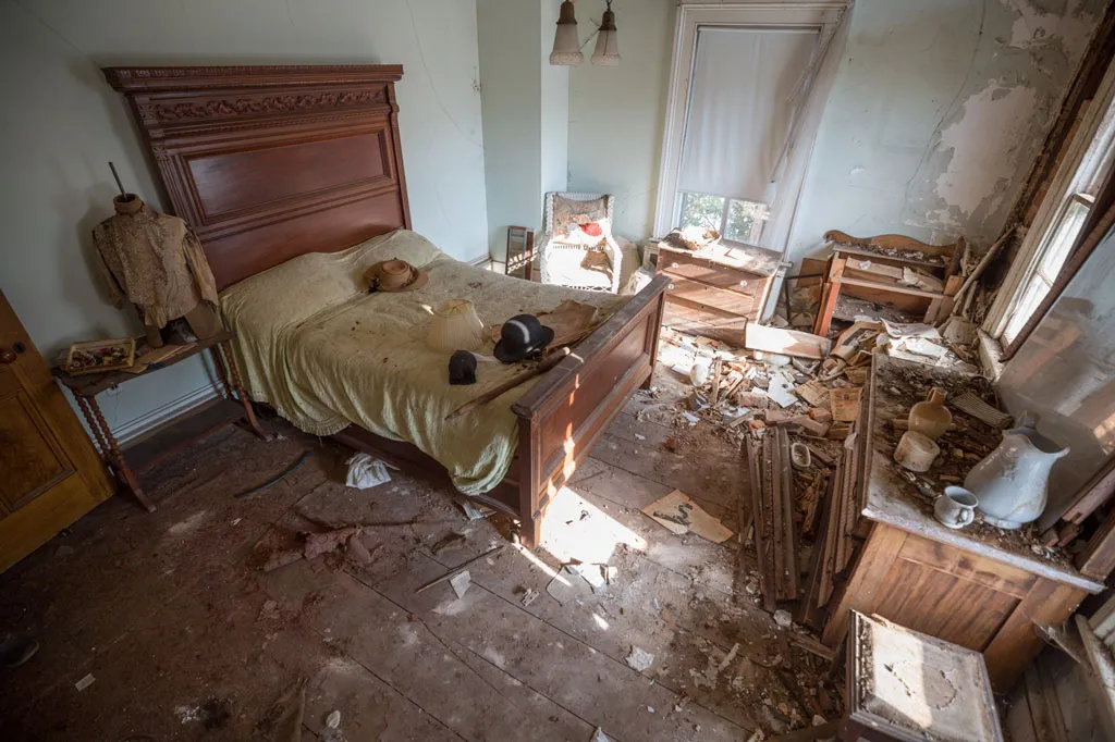 a large bedroom full of debris