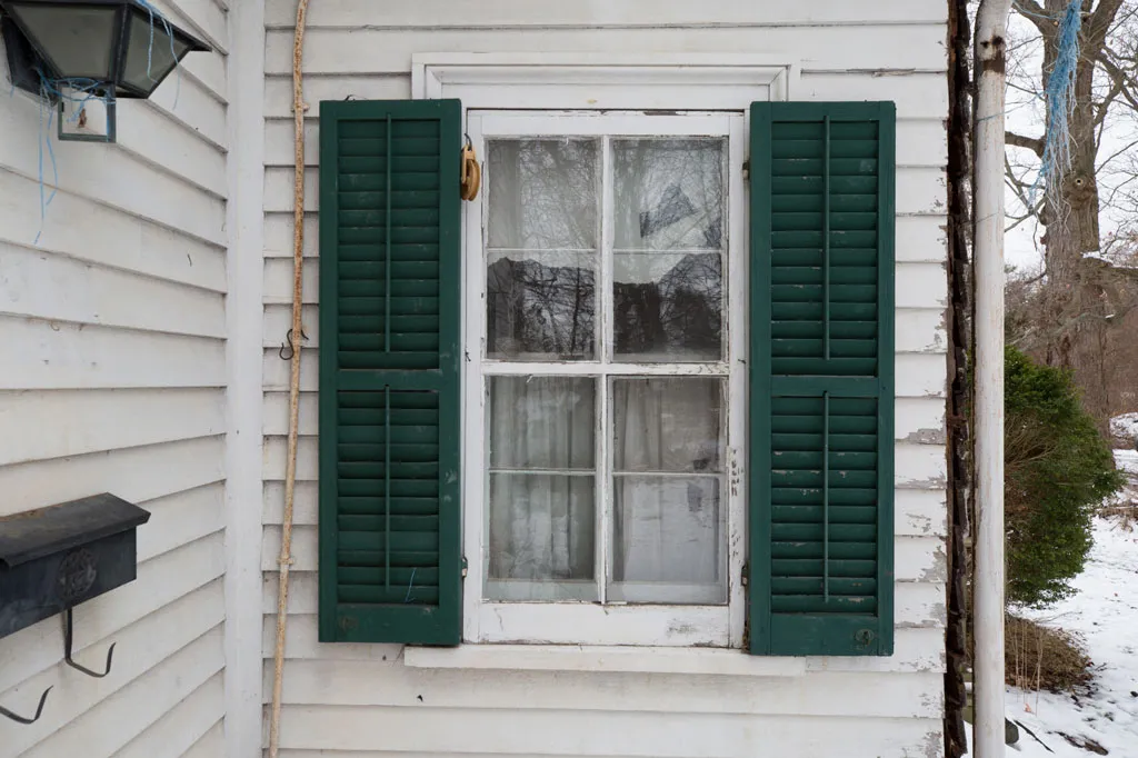 shutters surround a window