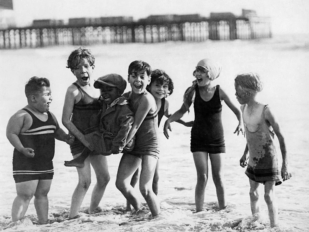 the little rascals group shot on the beach