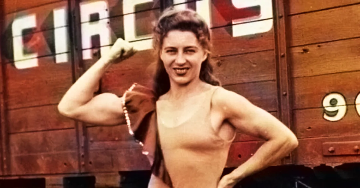 strongwoman colorized photo with big bicept