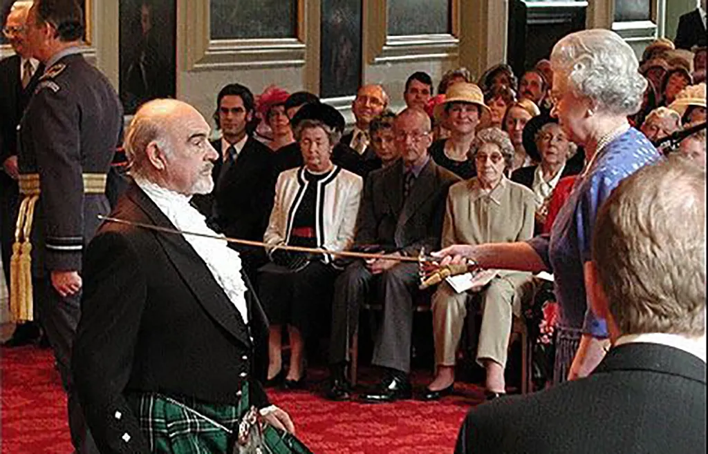 Connery being knighted by Queen Elizabeth 