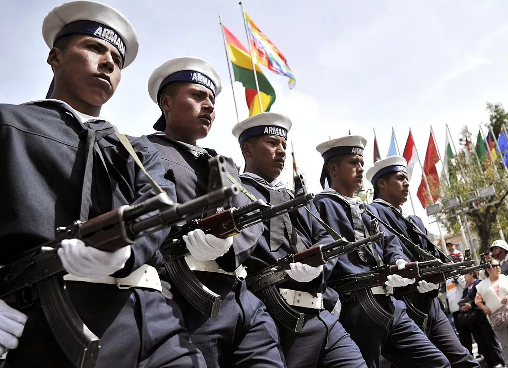 Bolivia navy troops parade during a ceremony commemorating the 134th anniversary of the invasion by Chilean troops