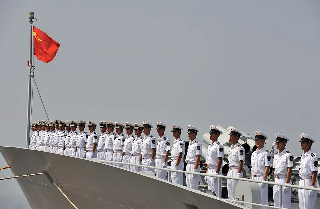 The Chinese Navy stand to attention on the advanced ship on July 16, 2009 in Zhoushan, Zhejiang 