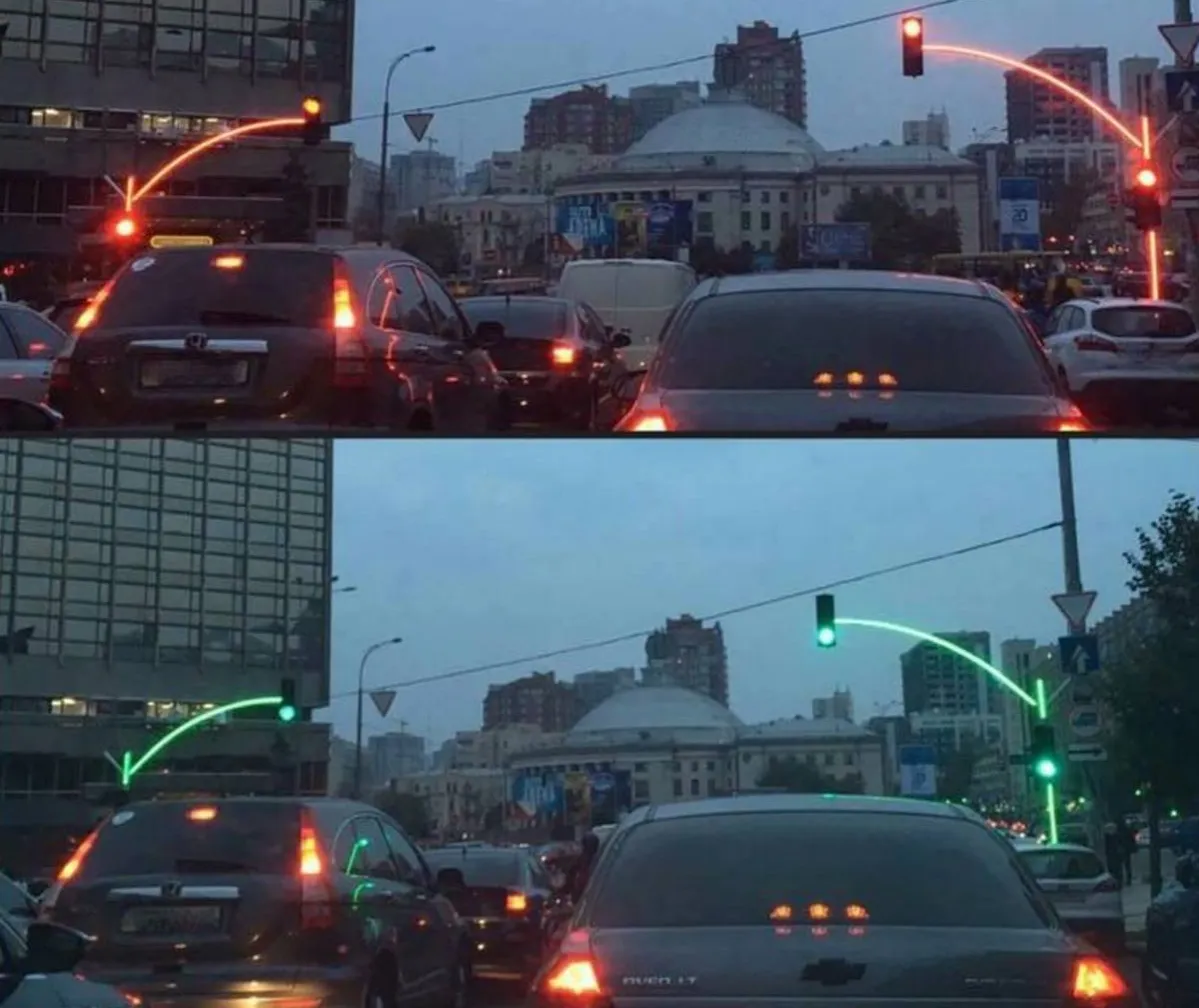 traffic lights with glowing poles that illuminate with the lights
