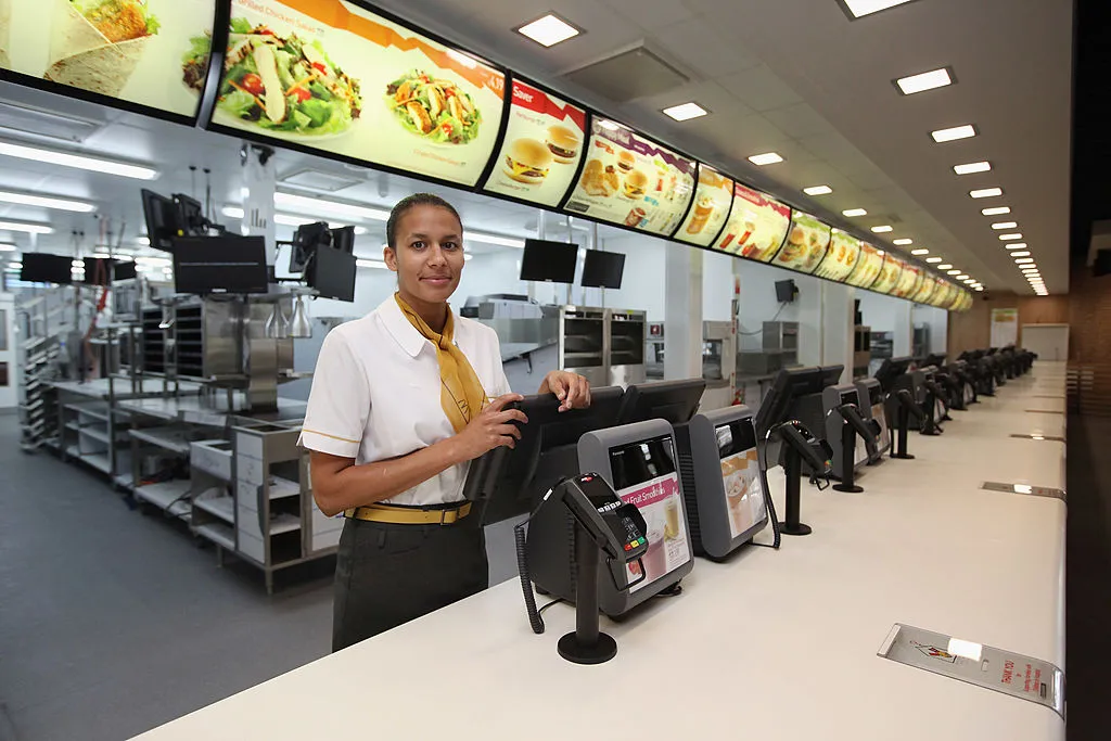 manager Rachel Lucien stands at the checkouts in the world's largest McDonald's restaurant 