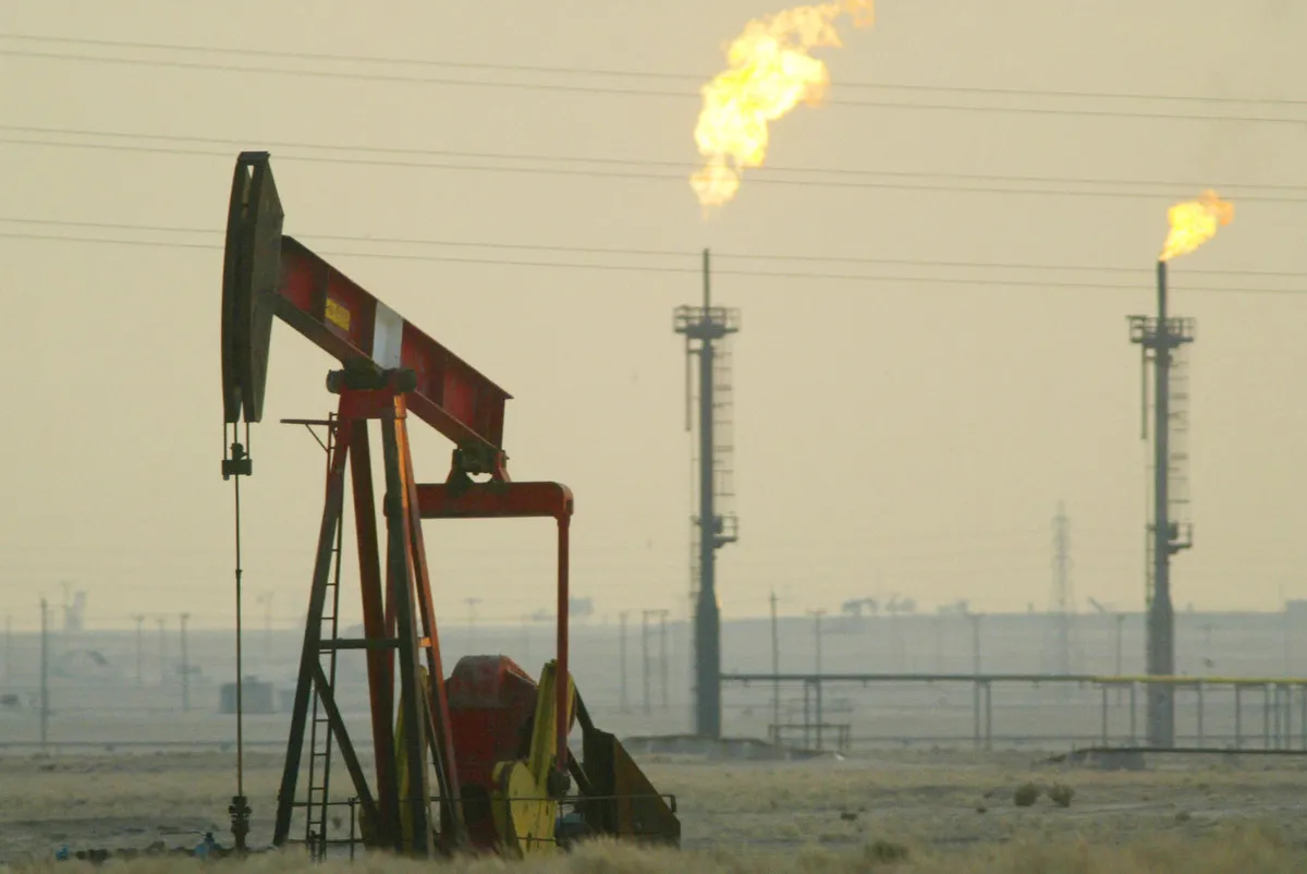 A derek pumps in a oil field January 15, 2003 near the Saudi Arabian border, Kuwait. Kuwait produces 10% of the worlds oil and has promised to increase production as needed in the event of a war in Iraq. 