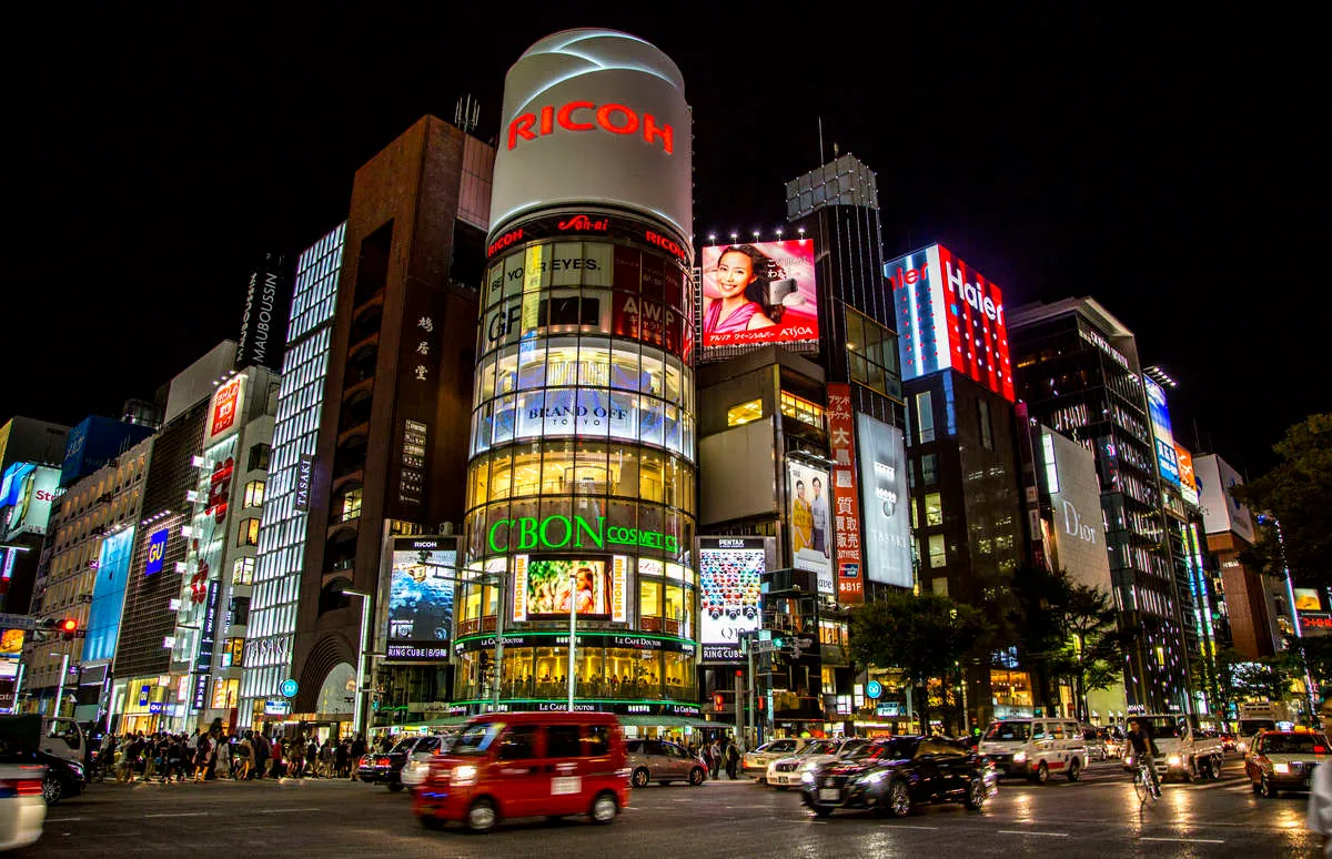 Street scene of Ginza at night. Ginza is one of the main business district of Centra Tokyo. Gathering the world most famous brands on both sides of the street, it is a paradise for shoppers.