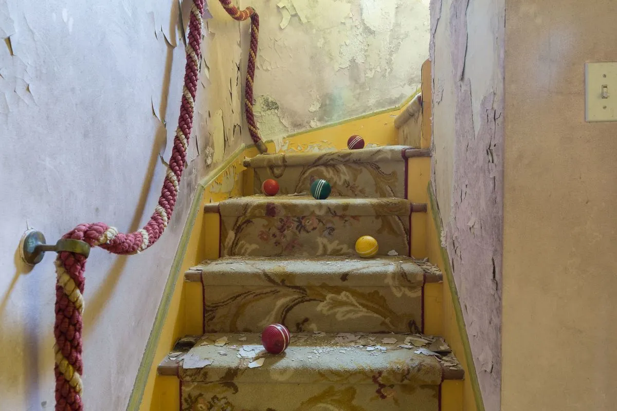 circus house balls on stairs abandoned house story