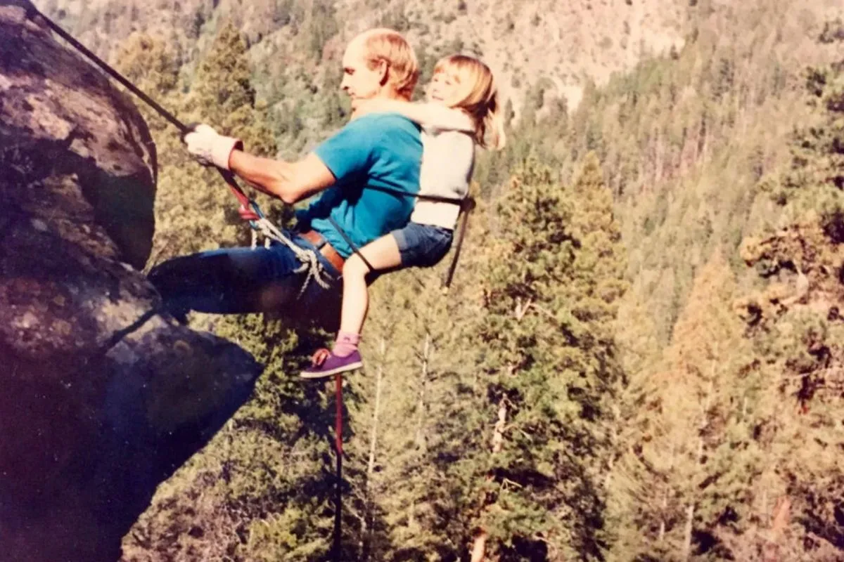 dad rapelling with daughter