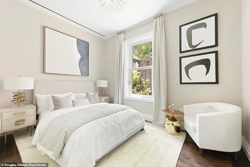 The bedroom shows a plush, large white bed with a matching reading chair beside a small accent table.