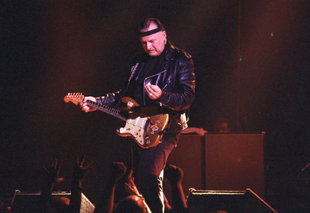 Dick Dale playing the guitar 