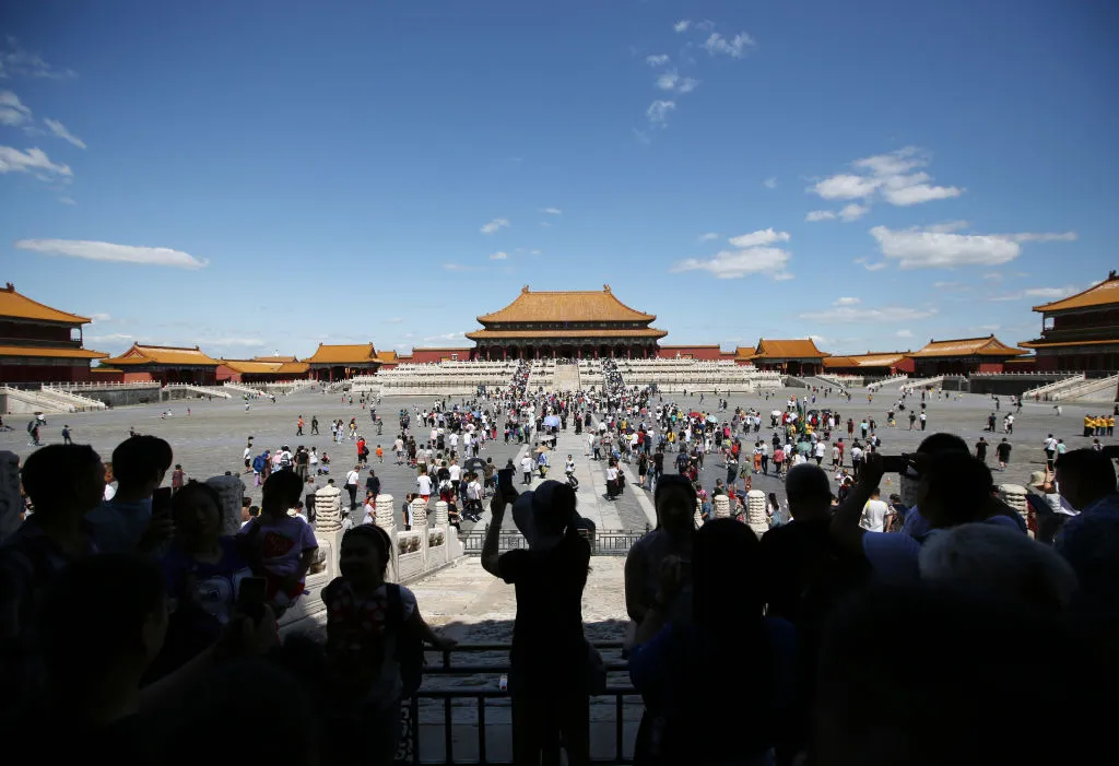 Crowds of people visit the Forbidden City in Beijing