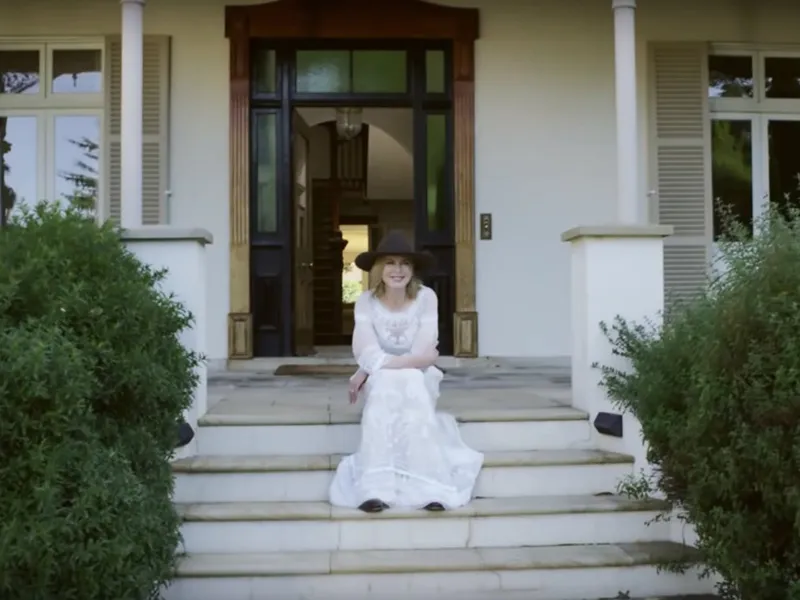 Nicole Kidman is pictured sitting on the steps leading to her Australia home
