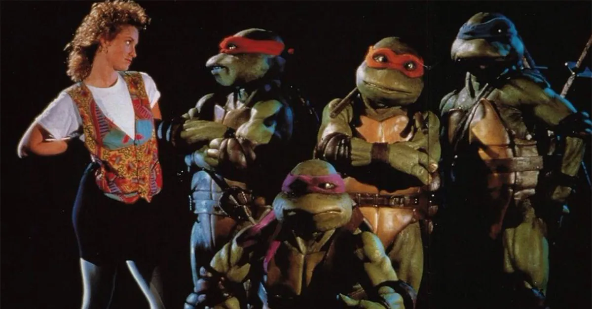teenage mutant ninja turtles in costume with a retro woman