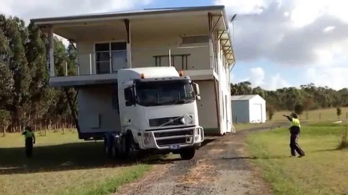 house being moved on a truck