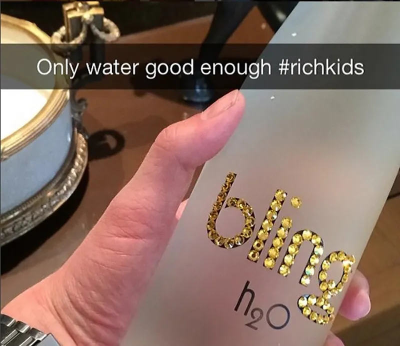 Woman holds bottle of Bling H20 and comments 