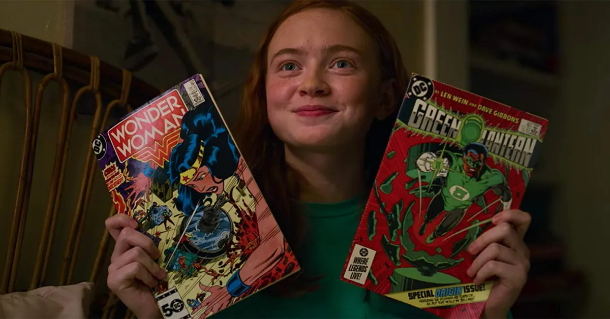 sadie sink holding up comic books