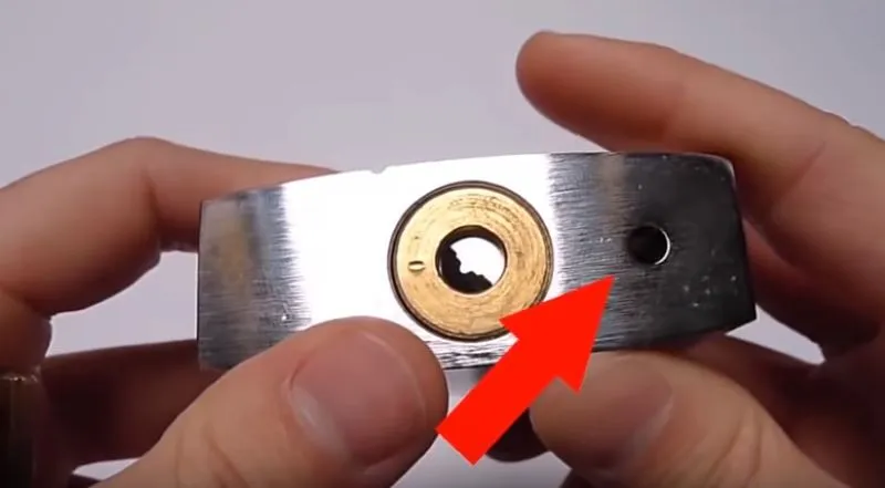 What Is That Extra Hoel On The Bottom Of A Padlock?