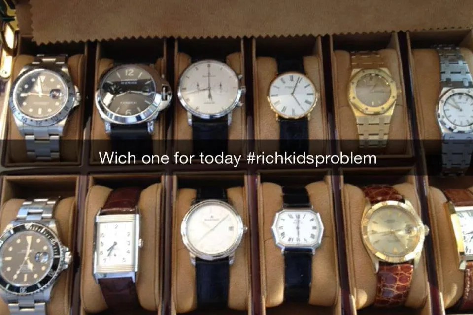 Person debates over which watch to wear.