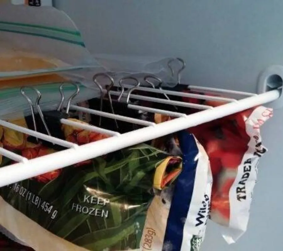 using binder clips to organize the freezer