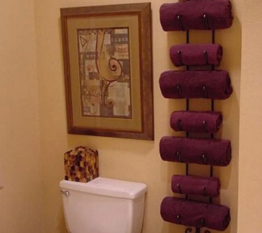 wine rack used for towel storage 