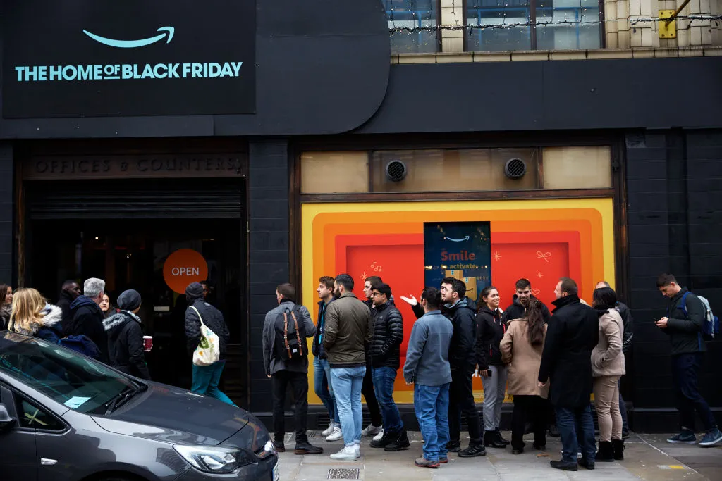 Shoppers queue outside an Amazon Black Friday pop-up 