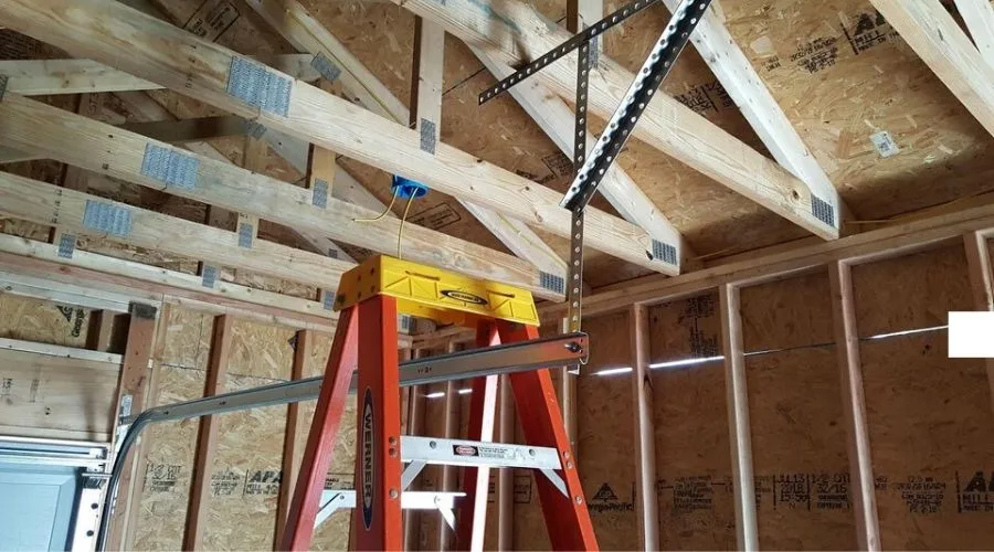 a person built their ladder into a garage opener by accident