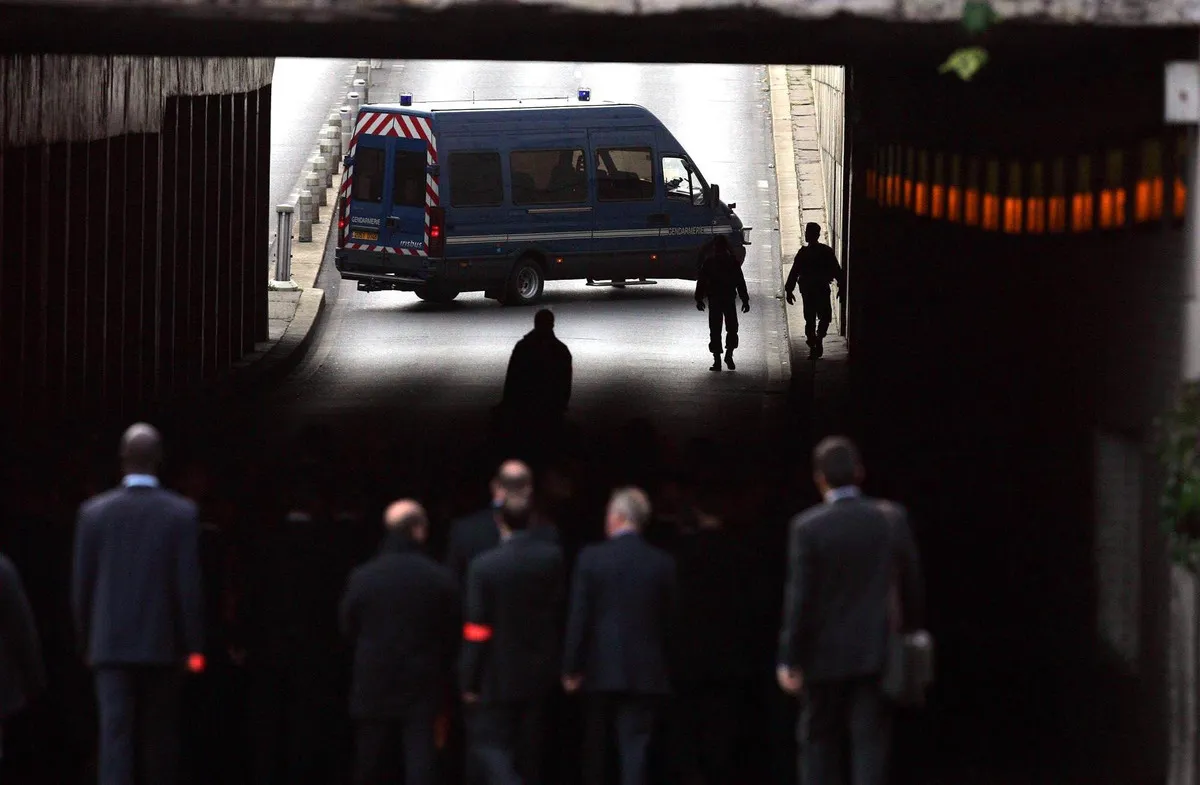 The jury from the Coroner's inquest into the deaths of Diana, Princess of Wales and Dodi Al Fayed enter the Pont de l'Alma tunnel in Paris where the Mercedes the couple were travelling in crashed.