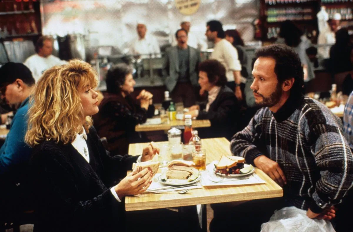 Harry and Sally sit in a restaurant.