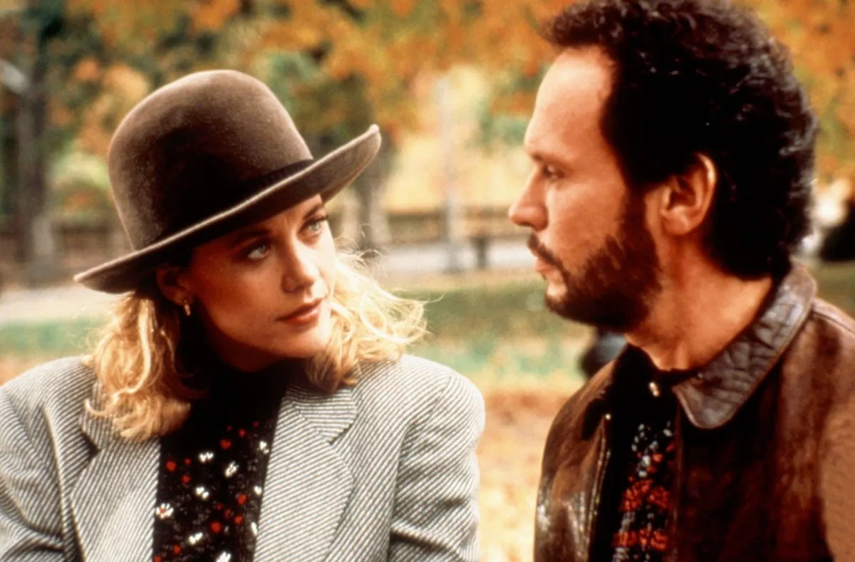 Harry and Sally talk in the park.