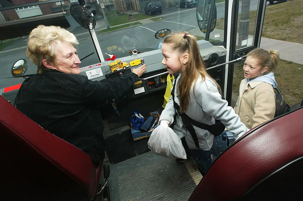 bus driver greets students