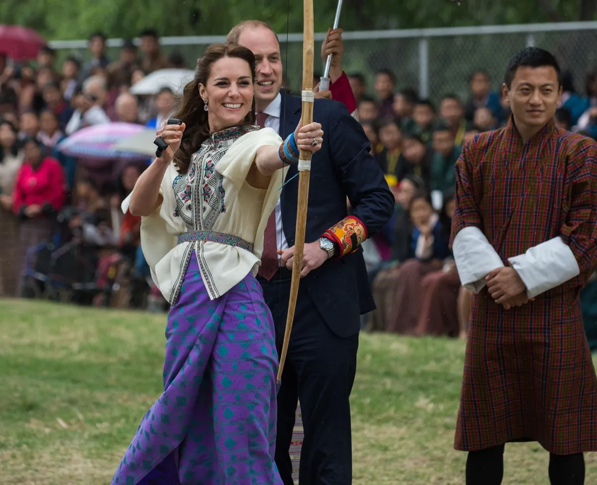 Kate Middleton practices archery in Bhutan.