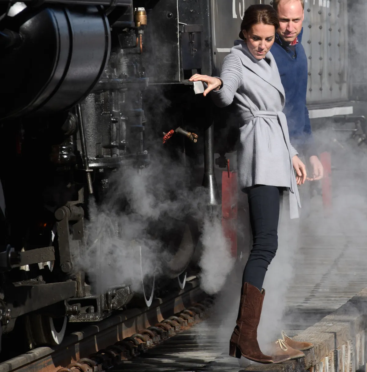 Catherine, Duchess of Cambridge and Prince William, Duke of Cambridge view a steam train as they visit Montana mountain Carcross.