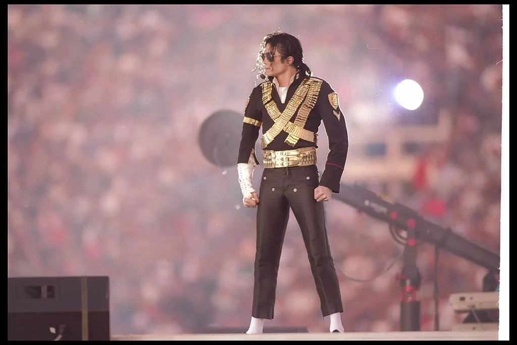 Michael Jackson poses onstage during the 1993 Super Bowl.