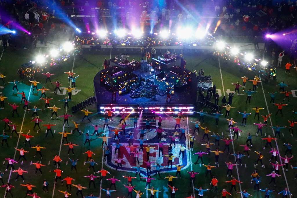 Performers fill the field during the Super Bowl.