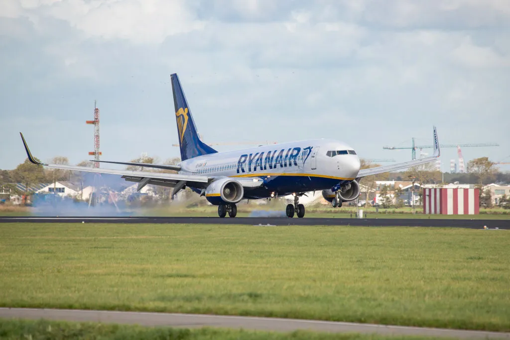 a ryanair airplane about to land on the runway