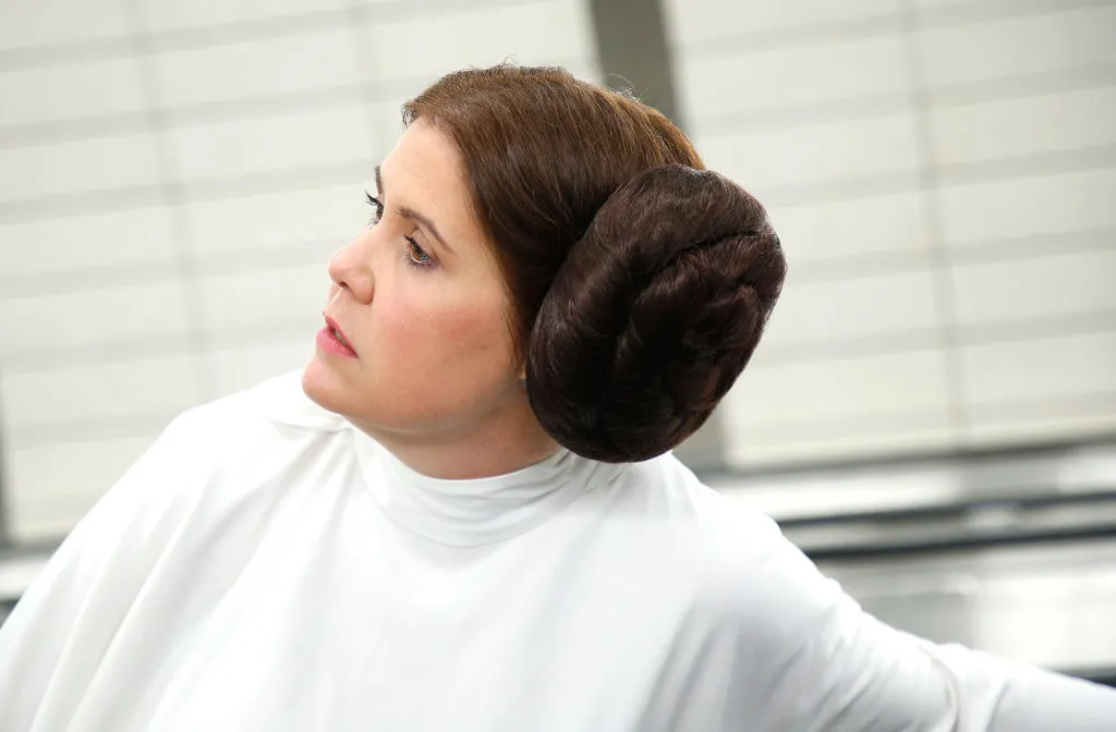a woman dressed as princess leia from star wars