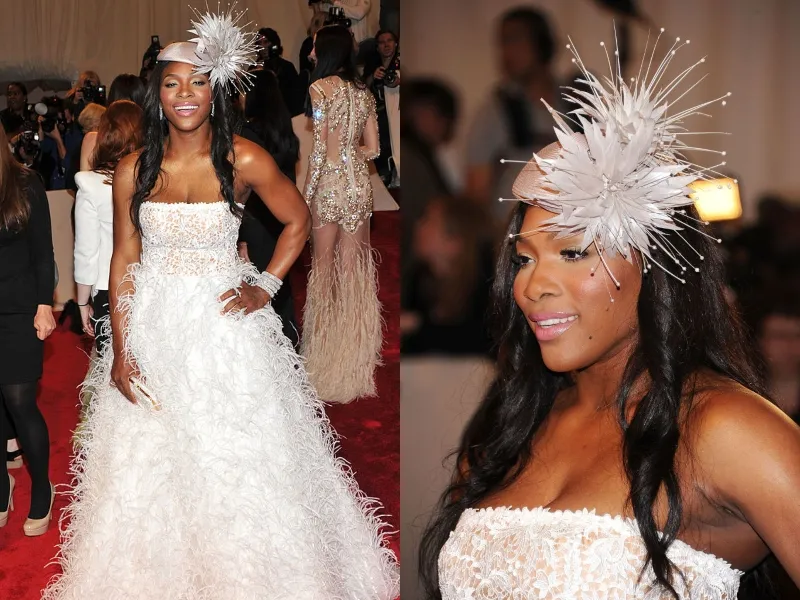 Serena wears a fluffy-white dress at an event.