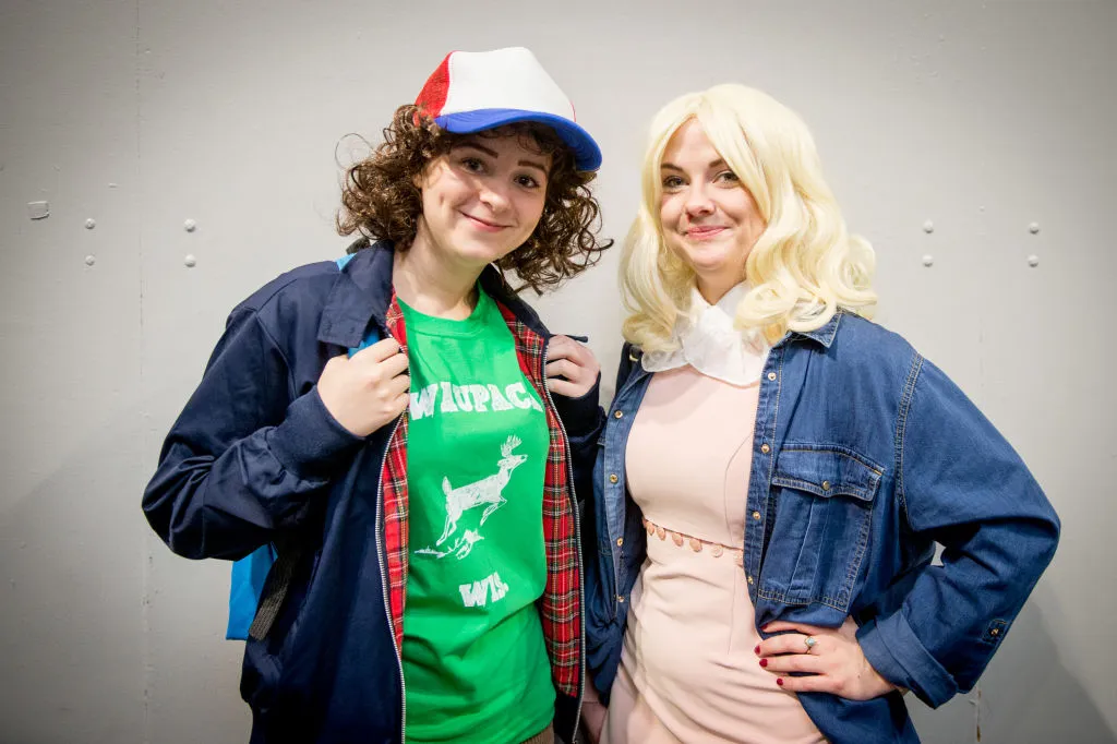 two women dressed as mike and eleven from stranger things