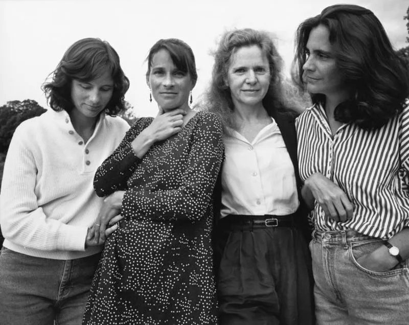 four women wearing stripesand dots