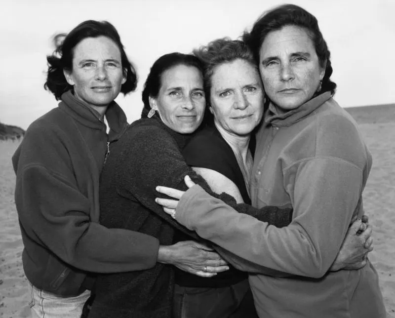 four sisters hugging