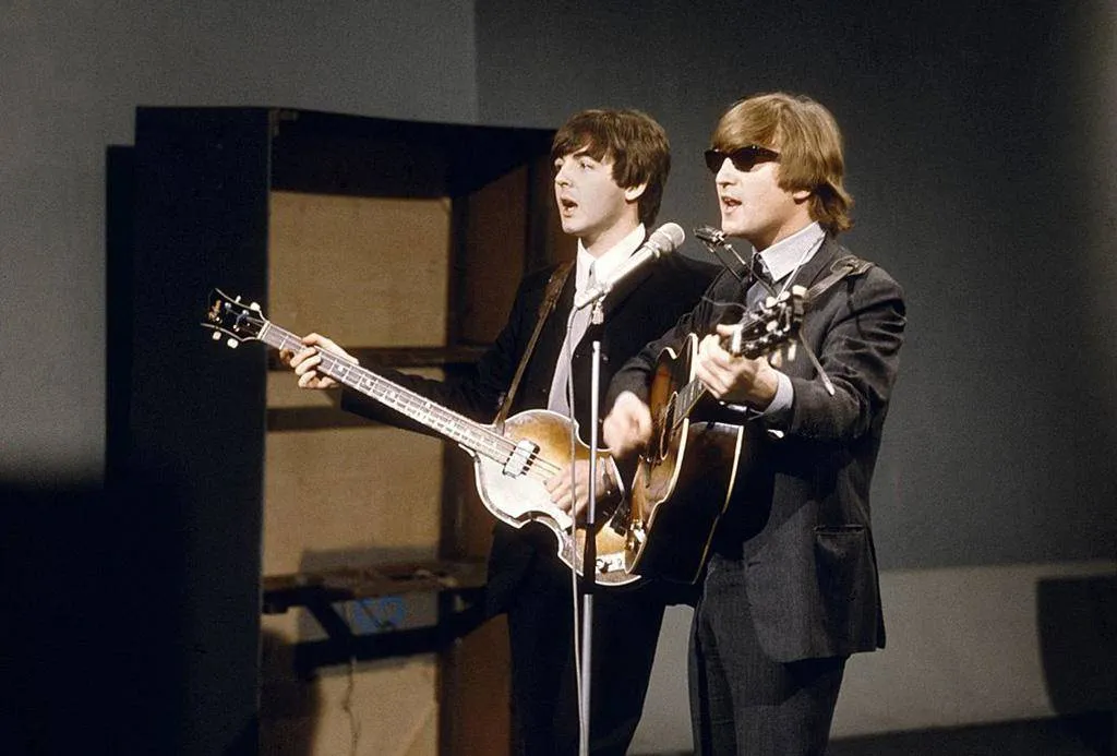 Lennon playing with McCartney