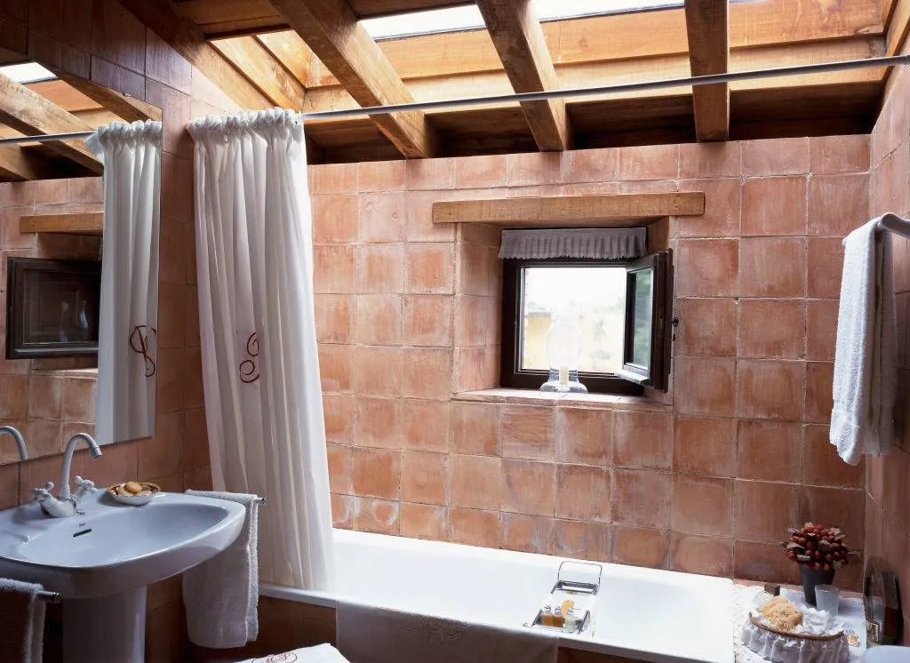 Partial view of a bathroom with a skylight.