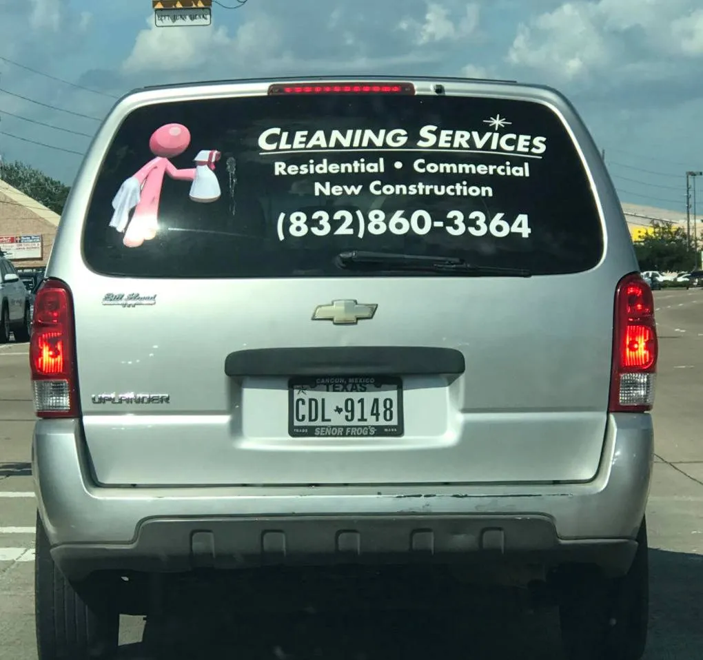 bird poop on cleaning ad on back of car lines up with where cartoon spray bottle is aimed