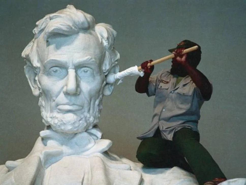 man cleaning lincoln memorial statue looks like he's q-tipping his ear